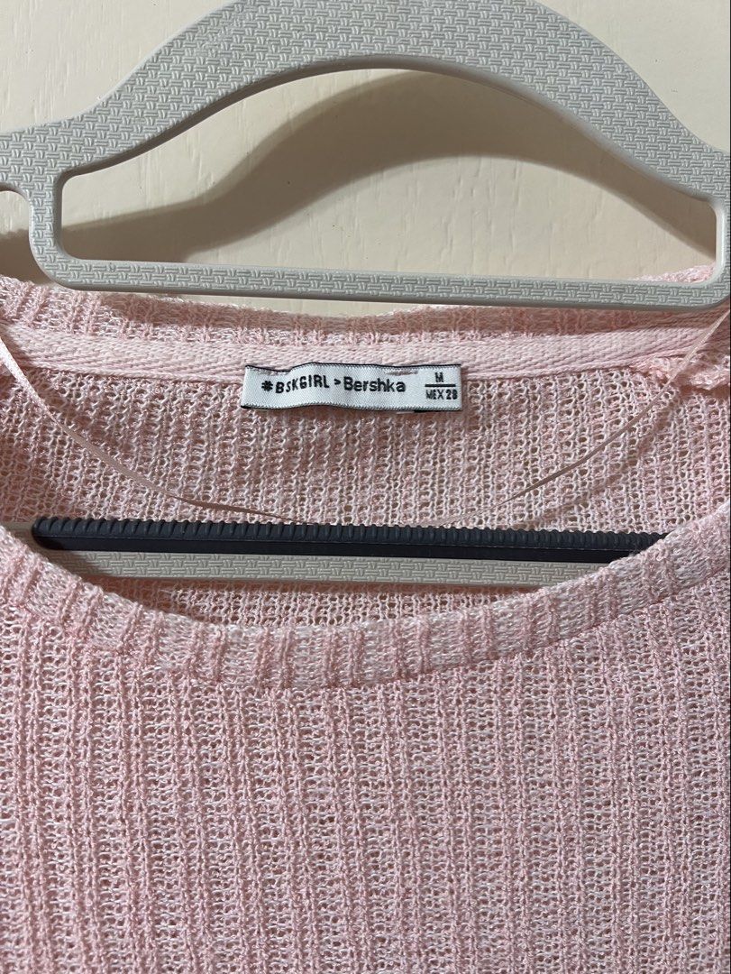 Bershka Pink Longsleeves Top (Category: Longsleeves) located in Silang. Submitted by _superjea (Listing ID 1425855461, Image 2). Description: - Pink crop top from Bershka - Features a round neck and long sleeves with lace detailing on the cuffs - The top has a textured knit fabric.