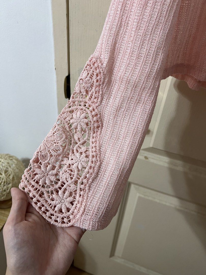 Bershka Pink Longsleeves Top (Category: Longsleeves) located in Silang. Submitted by _superjea (Listing ID 1425855461, Image 3). Description: - Pink crop top from Bershka - Features a round neck and long sleeves with lace detailing on the cuffs - The top has a textured knit fabric.
