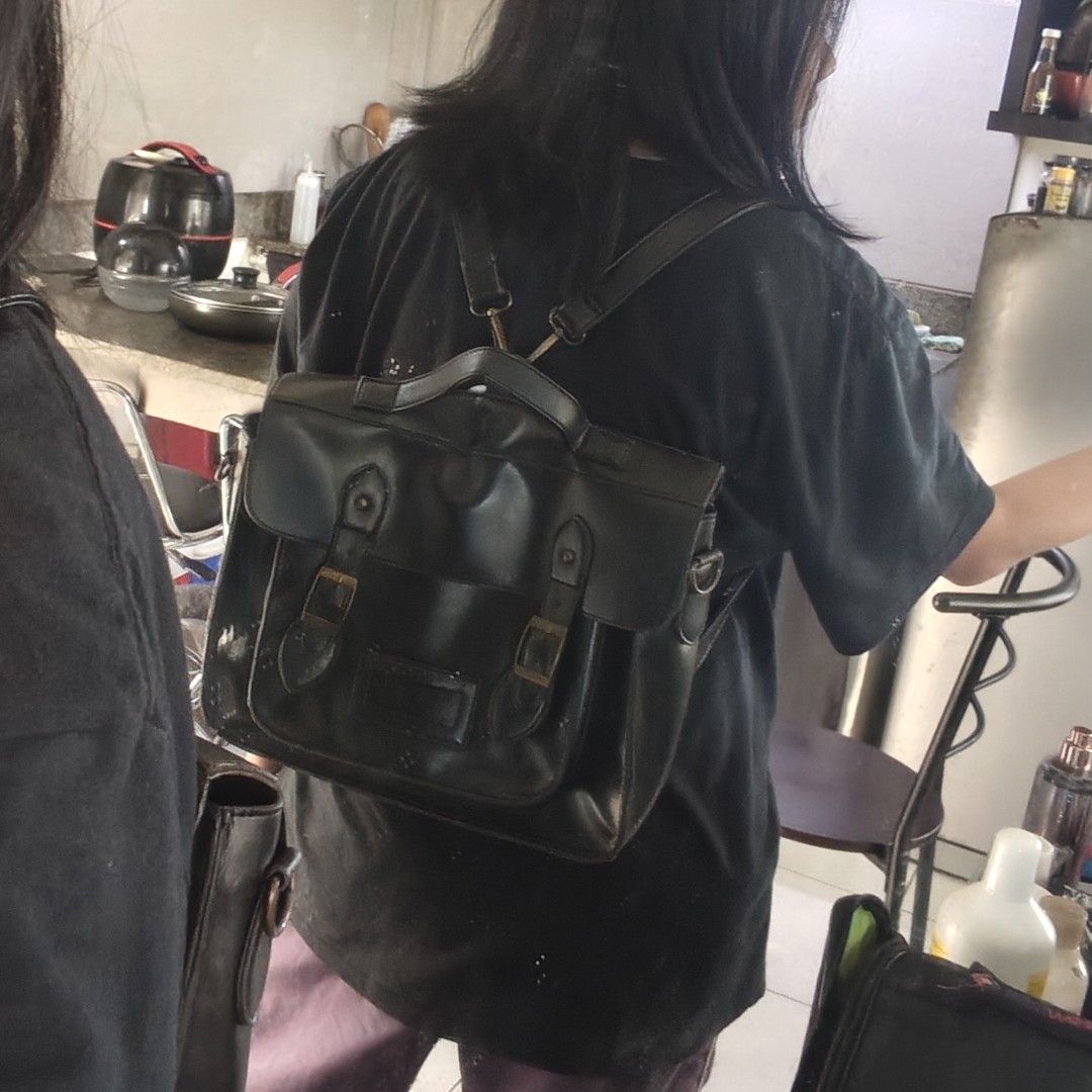 Black Satchel Bag Convertible to Backpack with Adjustable Straps (Category: Cross-body Bags) located in Quezon City. Submitted by ahcodacrem (Listing ID 1426003963, Image 3). Description: RFS: Decluttering Has adjustable straps, convertible to backpack Has minor issues like stitching (see pic) 30x24 cm.