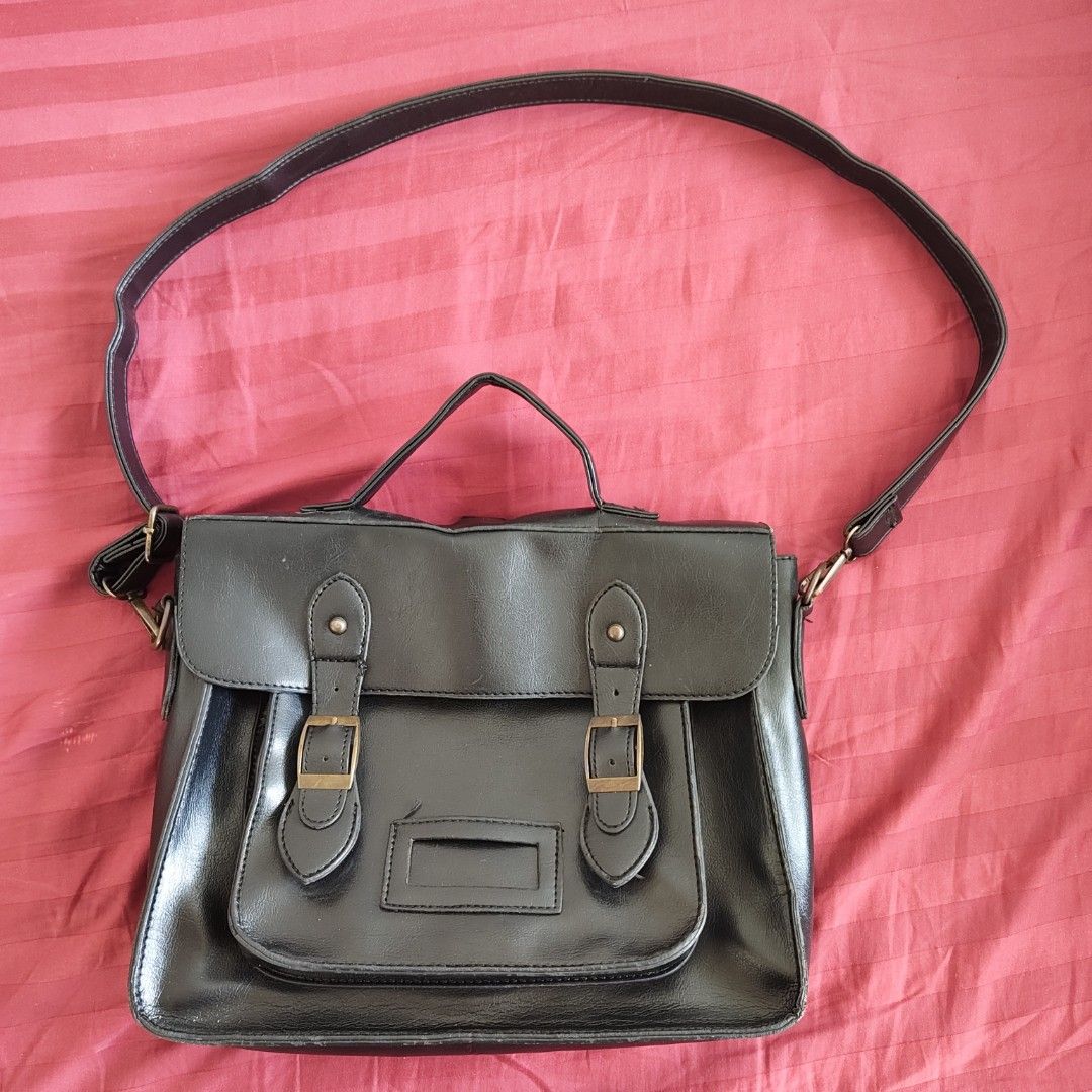 Black Satchel Bag Convertible to Backpack with Adjustable Straps (Category: Cross-body Bags) located in Quezon City. Submitted by ahcodacrem (Listing ID 1426003963, Image 1). Description: RFS: Decluttering Has adjustable straps, convertible to backpack Has minor issues like stitching (see pic) 30x24 cm.