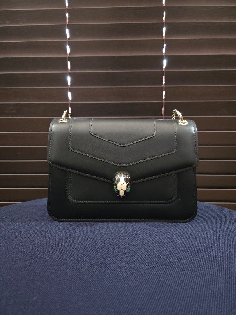 Bvlgari Serpenti (Category: Luxury Bags & Wallets) located in Paranaque City. Submitted by dclutterqueen (Listing ID 1425875216, Image 1). Description: Bvlgari Serpenti Bag Medium size 💯 Leather in Black 🇯🇵Acquired preloved from Japan 👜 Measures approximately 25x 16 cm ⭐️ Comes with mirror, no dustbag.