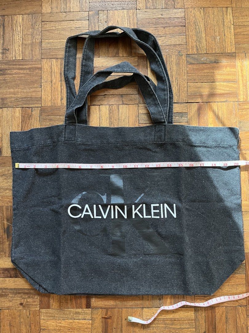 Calvin Klein Denim Tote Bag (Category: Tote Bags) located in Makati City. Submitted by yoursecondbest (Listing ID 1425825837, Image 3). Description: Large capacity..