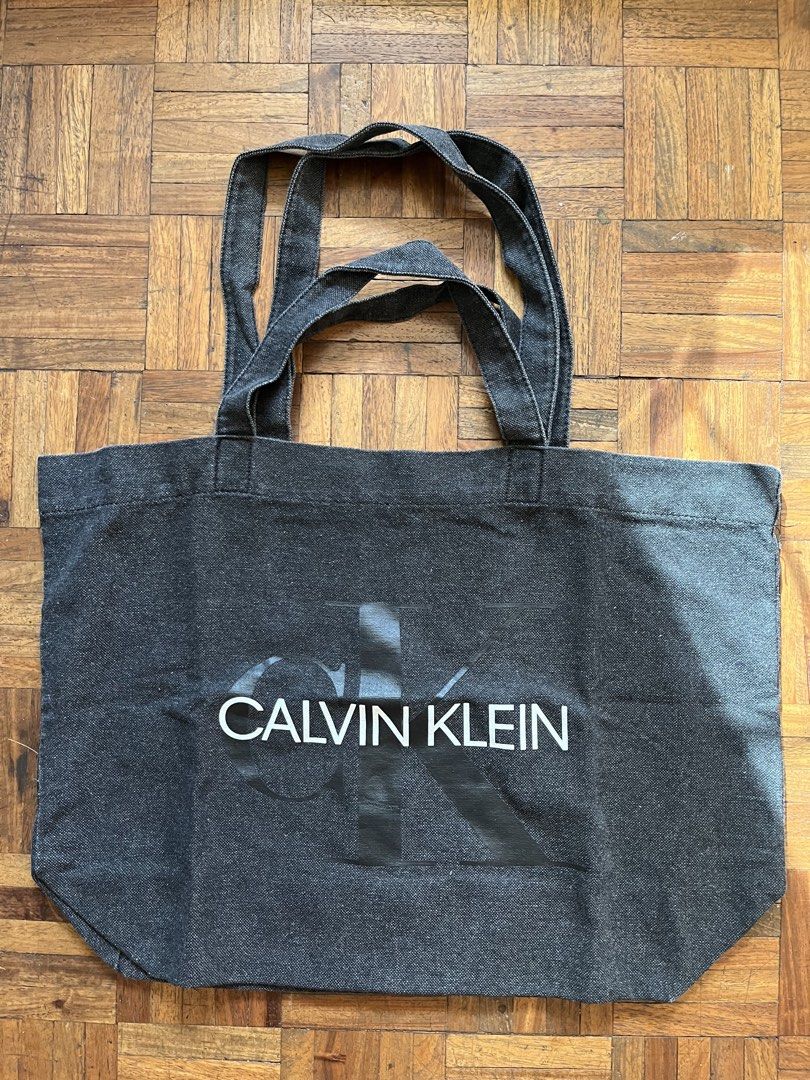 Calvin Klein Denim Tote Bag (Category: Tote Bags) located in Makati City. Submitted by yoursecondbest (Listing ID 1425825837, Image 1). Description: Large capacity..