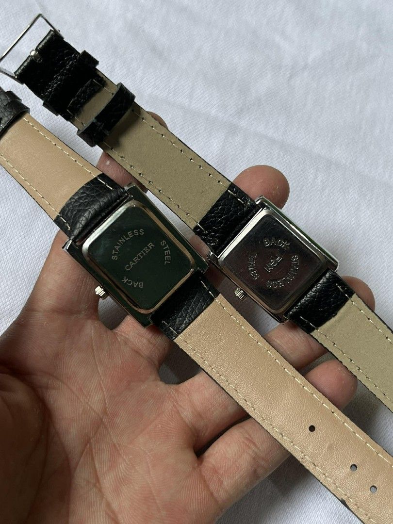 Cartier Tank Watch with Leather Strap (Category: Luxury Watches) located in Manila. Submitted by jaydrenn (Listing ID 1425824210, Image 2). Description: Classic Cartier Tank watch featuring a rectangular face with Roman numeral hour markers. The watch has a black leather strap and a stainless steel back. The dial is white with blue hands. The watch is a timeless design, suitable for everyday wear..