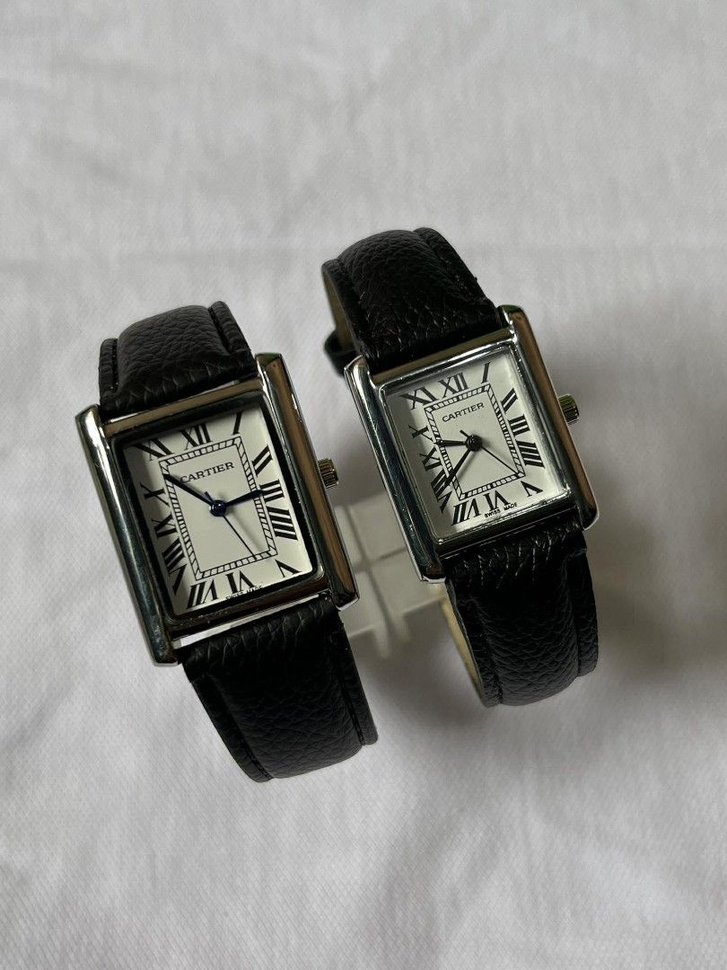 Cartier Tank Watch with Leather Strap (Category: Luxury Watches) located in Manila. Submitted by jaydrenn (Listing ID 1425824210, Image 1). Description: Classic Cartier Tank watch featuring a rectangular face with Roman numeral hour markers. The watch has a black leather strap and a stainless steel back. The dial is white with blue hands. The watch is a timeless design, suitable for everyday wear..