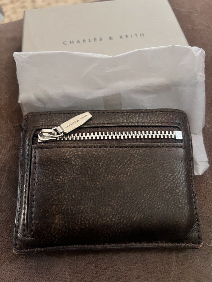 Charles & Keith Carli Cardholder Dark Brown (Category: Wallets & Card holders) located in Manila. Submitted by nicanini (Listing ID 1425875163, Image 2). Description: bought for 1,399php in Singapore - withd old og card box, paper bag (slightly stained) sg exclusive color dark brown slightly negotiable rfs: got a new card holder Loc: Taft, Malate, Manila Mop: maya, gotyme, maribank, bpi, vybe, ub, security bank You can book your own rider or can 