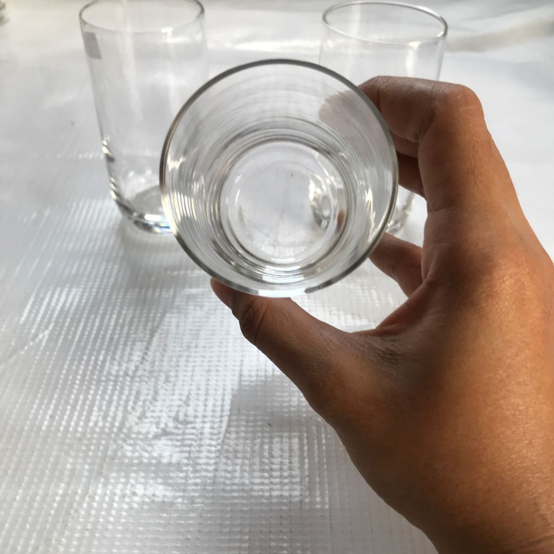Clear Drinking Glasses Set of 3 #4445 (Category: Other Kitchenware & Tableware) located in Malabon City. Submitted by mldg.surplus (Listing ID 1425877808, Image 2). Description: Set of three clear drinking glasses. These glasses have a simple, cylindrical design with a slightly rounded base. They are suitable for various beverages. The glasses appear to be of a standard size, perfect for everyday use. They are clean and ready to be used. MLDG Sur