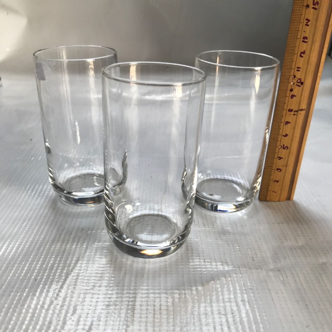 Clear Drinking Glasses Set of 3 #4445 (Category: Other Kitchenware & Tableware) located in Malabon City. Submitted by mldg.surplus (Listing ID 1425877808, Image 1). Description: Set of three clear drinking glasses. These glasses have a simple, cylindrical design with a slightly rounded base. They are suitable for various beverages. The glasses appear to be of a standard size, perfect for everyday use. They are clean and ready to be used. MLDG Sur