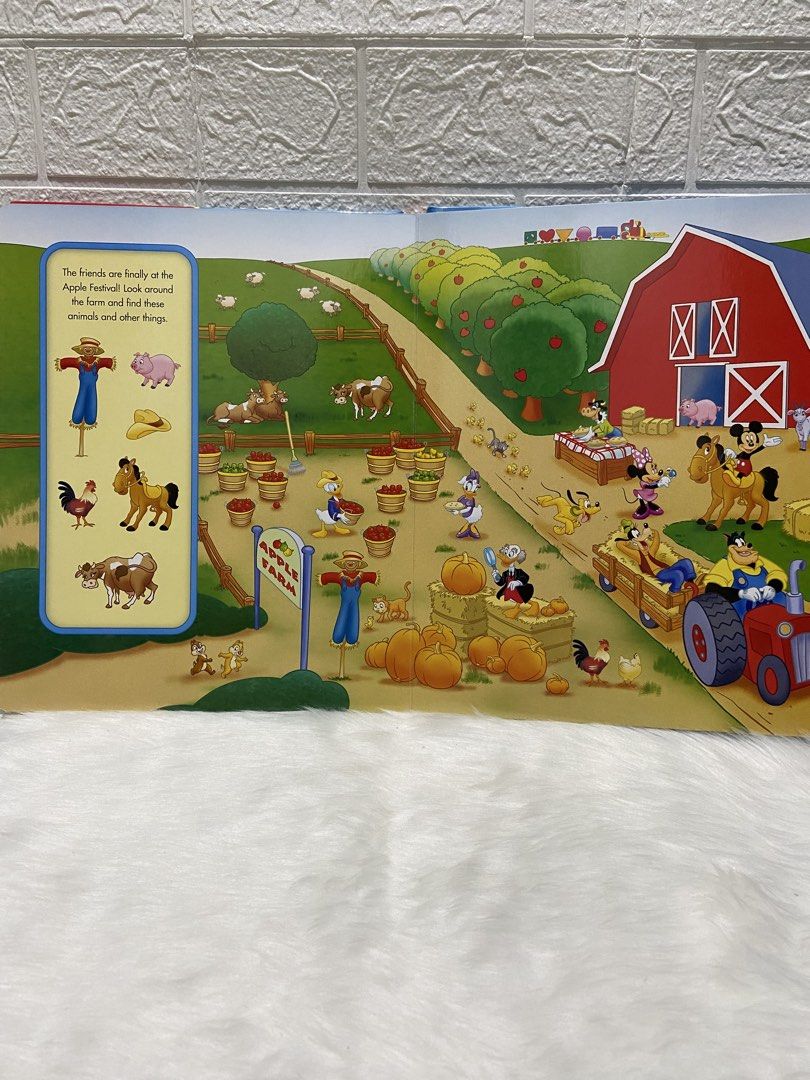 Disney Mickey Mouse Clubhouse On The Go Look and Find Book (Category: Children's Books) located in Caloocan City. Submitted by dmbooknook (Listing ID 1425970671, Image 3). Description: - Very good used condition with tear sa cover, like new inside. - Oversized boarbook - Colorful Illustration Disney Mickey Mouse Clubhouse "On The Go" Look and Find book. It features various scenes with Mickey Mouse and friends, including the farm, underwater scene
