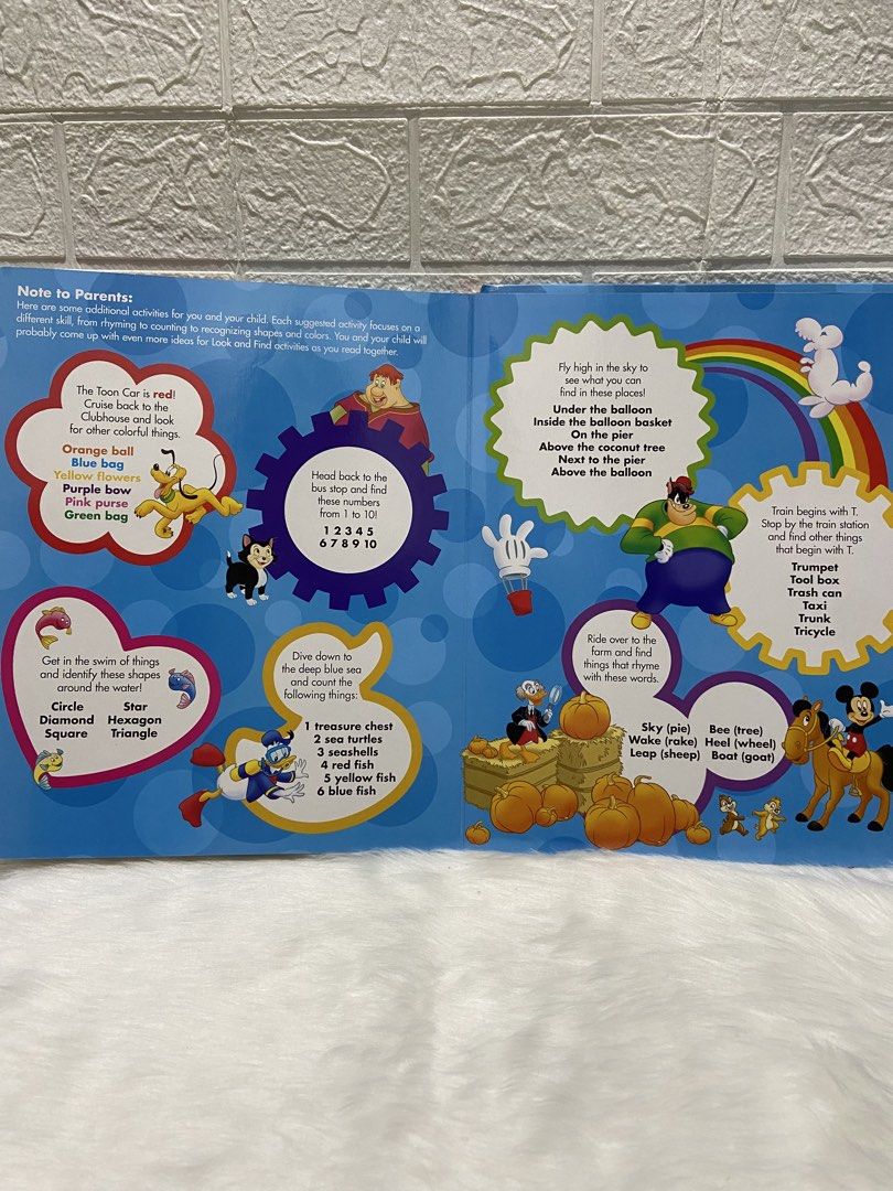 Disney Mickey Mouse Clubhouse On The Go Look and Find Book (Category: Children's Books) located in Caloocan City. Submitted by dmbooknook (Listing ID 1425970671, Image 2). Description: - Very good used condition with tear sa cover, like new inside. - Oversized boarbook - Colorful Illustration Disney Mickey Mouse Clubhouse "On The Go" Look and Find book. It features various scenes with Mickey Mouse and friends, including the farm, underwater scene