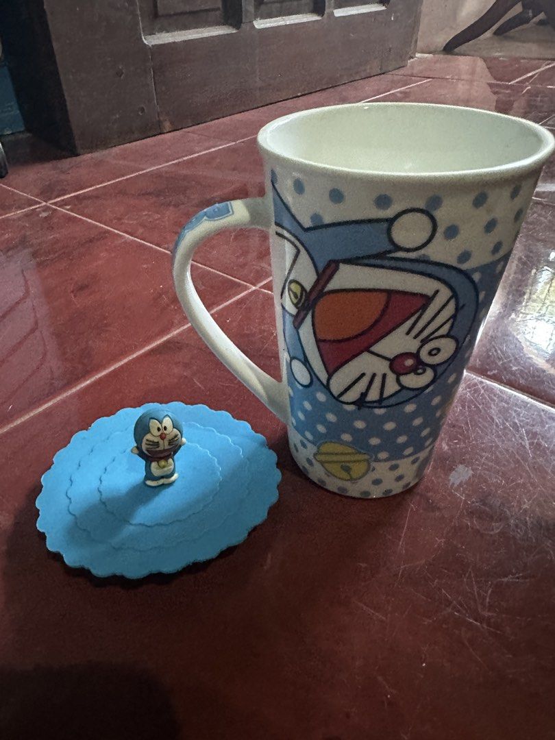 Doraemon Mug with Lid (Category: Coffee & Tea Tableware) located in Taguig. Submitted by seek_and_ship (Listing ID 1425923513, Image 2). Description: .