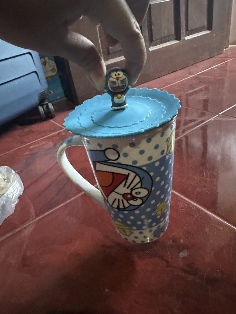 Doraemon Mug with Lid (Category: Coffee & Tea Tableware) located in Taguig. Submitted by seek_and_ship (Listing ID 1425923513, Image 3). Description: .