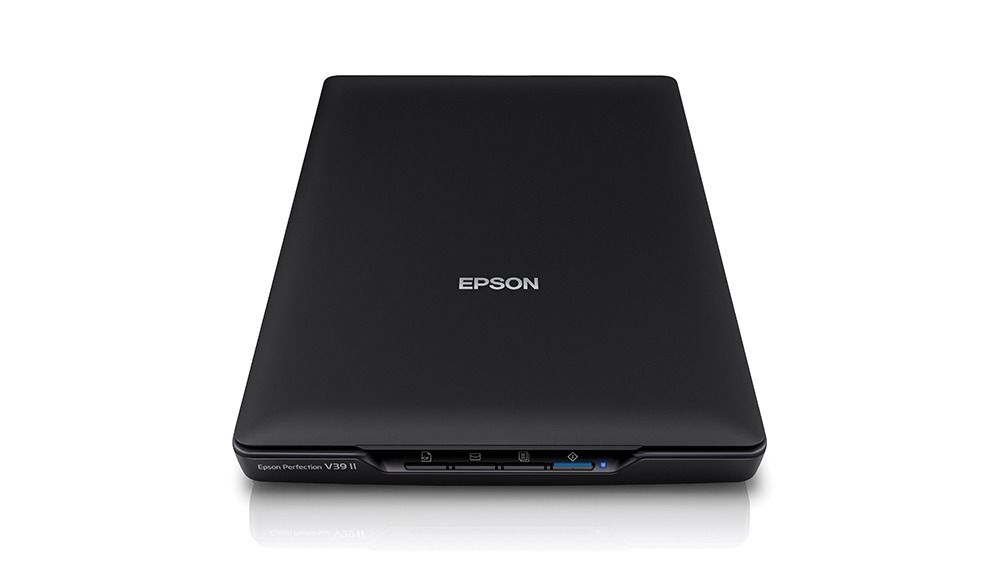 Epson Perfection V39II Flatbed Photo Scanner (Category: Printers, Scanners & Copiers) located in Manila. Submitted by random_94 (Listing ID 1425842750, Image 1). Description: - A4 flatbed colour image scanner - 4,800 x 4,800 dpi - Interface: USB 2.0 The Epson PerfectionTM V39II combines exceptional scanning quality with superior scanning capabilities to capture the finest details. Compact and light, the V39II is designed to save space, reduce clu