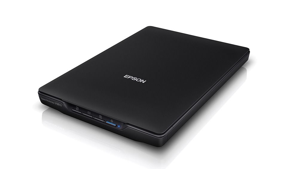 Epson Perfection V39II Flatbed Photo Scanner (Category: Printers, Scanners & Copiers) located in Manila. Submitted by random_94 (Listing ID 1425842750, Image 3). Description: - A4 flatbed colour image scanner - 4,800 x 4,800 dpi - Interface: USB 2.0 The Epson PerfectionTM V39II combines exceptional scanning quality with superior scanning capabilities to capture the finest details. Compact and light, the V39II is designed to save space, reduce clu