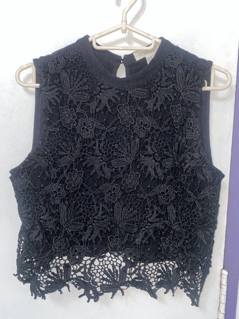 Forever21 black lace top crop S (Category: Sleeveless) located in Mandaluyong City. Submitted by van68 (Listing ID 1425834991, Image 2). Description: Brand: Forever21 Size: S Length: 17” - Fits up to 36” bust - Stretchable, cotton fabric - Defect: the topmost button isn’t lined with fabric 📍Mandaluyong city 📍Can meetup in any MRT station during weekends.