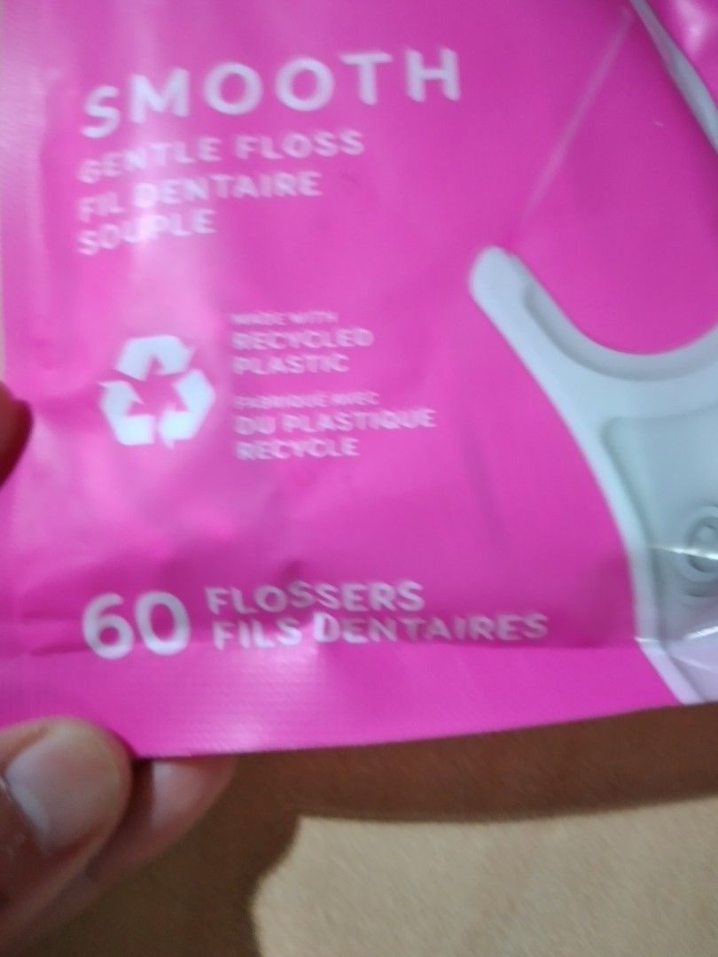 Grin Smooth Gentle Floss 60 Count (Category: Oral Care) located in Baguio. Submitted by tipiditis (Listing ID 1425859533, Image 3). Description: Grin Smooth Gentle Floss with mint flavor. Contains 60 flossers made with recycled plastic. The packaging indicates it is Earth Lovin' and designed for personal care. The flossers are designed for gentle cleaning. RFS: Extra.