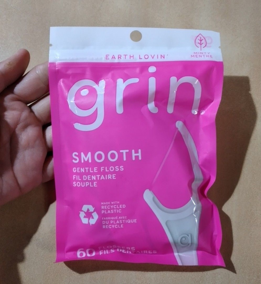 Grin Smooth Gentle Floss 60 Count (Category: Oral Care) located in Baguio. Submitted by tipiditis (Listing ID 1425859533, Image 1). Description: Grin Smooth Gentle Floss with mint flavor. Contains 60 flossers made with recycled plastic. The packaging indicates it is Earth Lovin' and designed for personal care. The flossers are designed for gentle cleaning. RFS: Extra.