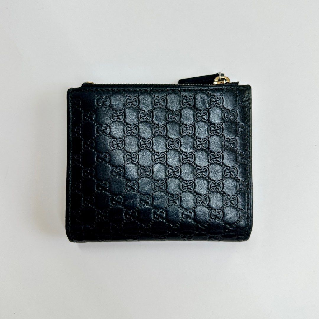 Gucci Microguccissima Bifold Wallet (Category: Luxury Bags & Wallets) located in Cebu City. Submitted by rayndeer_28 (Listing ID 1425934443, Image 3). Description: Gucci Microguccissima Bifold Wallet Black Leather FEATURES: Slip Pocket for Bills Zipped Coin Compartment 6 Card Slots 2 Slip Pockets INCLUSIONS: Box Dustbag (restitched logo as it once fell apart) Care Cards 2 Gucci Silica Gel Packets See photos for details. All sales final, Shipping 
