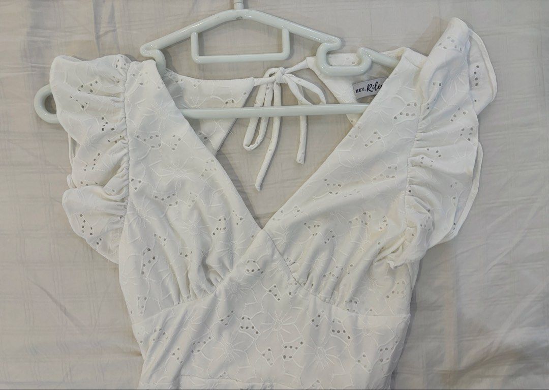 Hey Riley White Eyelet Dress (Category: Dresses) located in Manila. Submitted by harlem55 (Listing ID 1425903569, Image 1). Description: Brand new, retails for 1,400 (last 2 photos for reference) Pretty eyelet dress with thick fabric. never worn. bought for a baptismal but wore something else instead. .
