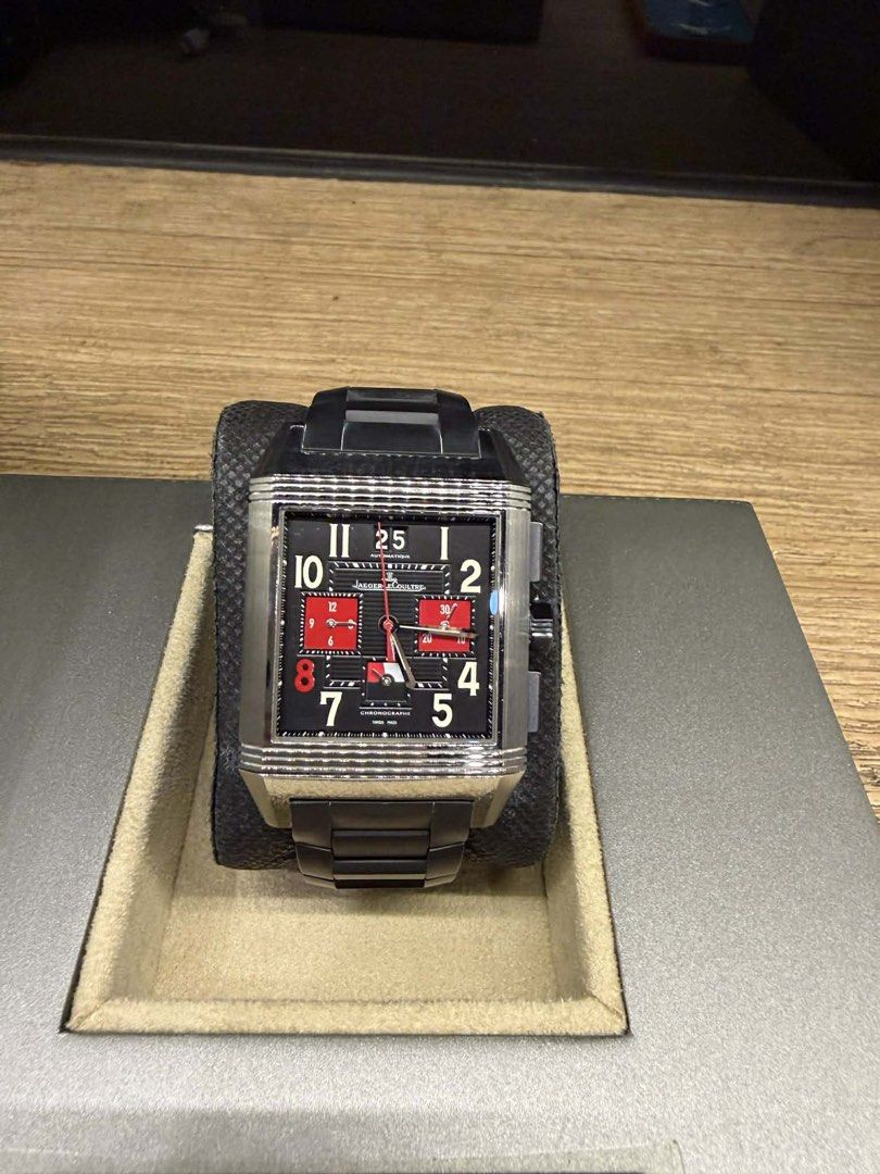 JLC Reverso Squadra World Chronograph (Category: Men's Watches) located in Pasig City. Submitted by moimoigo (Listing ID 1425823979, Image 2). Description: Jaeger-LeCoultre Reverso Squadra World Chronograph • Case: Titanium, reversible case. • Movement: Automatic Caliber 753 chronograph. • Features: Grand date, night/day indicator, and world time display. • Bracelet: Articulated rubber bracelet. •500,000.