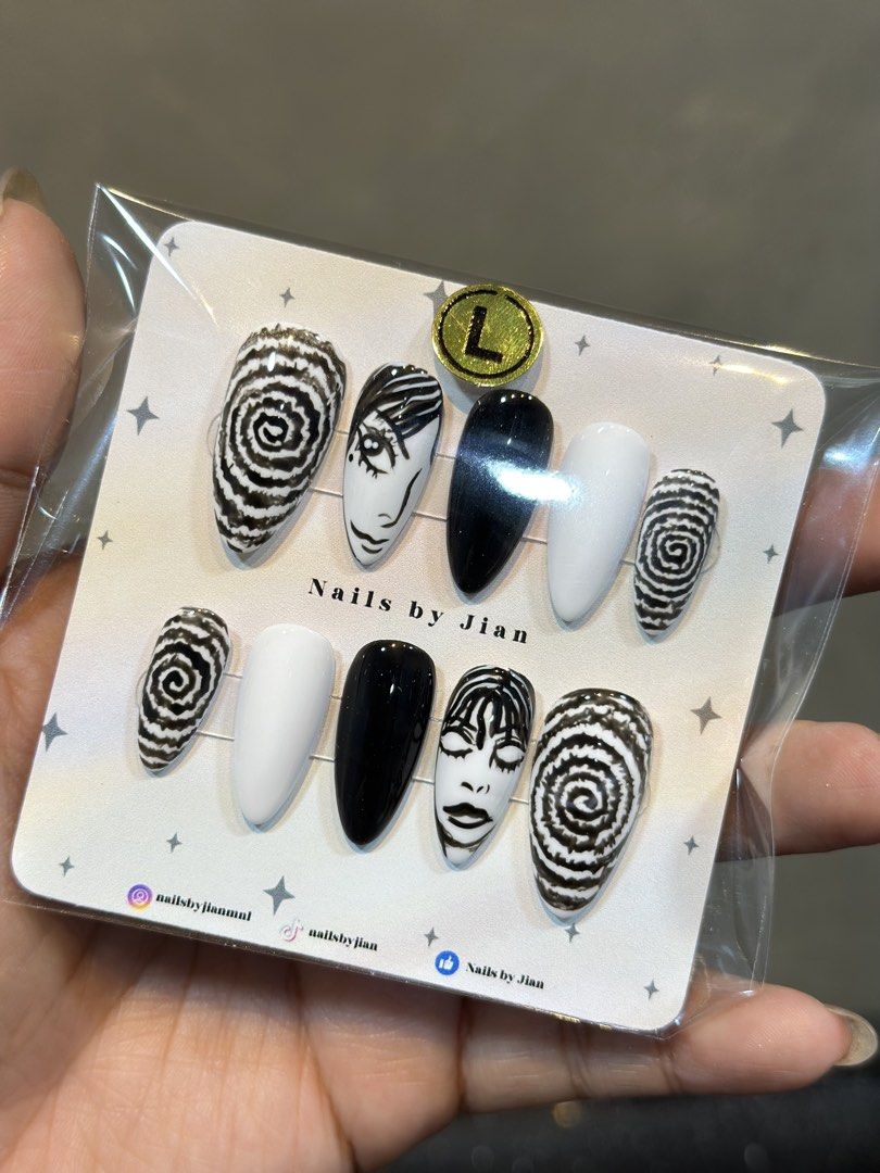 Junji Ito Press-on Nails (Category: Hands & Nails) located in Manila. Submitted by nailsbyjian (Listing ID 1425854308, Image 1). Description: comes with prep kit. - nail file - nail buffer - alcohol pad - wooden pusher - nail glue - nail adhesive tabs.