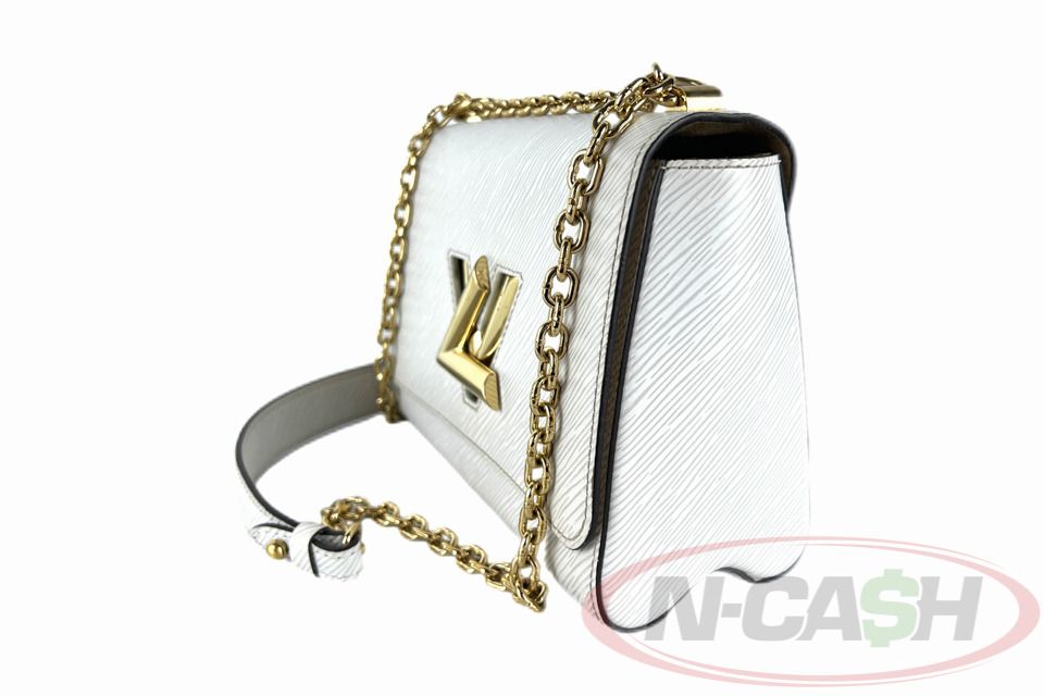Louis Vuitton Twist MM (Category: Luxury Bags & Wallets) located in Makati City. Submitted by luxury_by_ncash_2 (Listing ID 1425857920, Image 2). Description: N-Cash Pawnshop "Instant Cash for Bags, Watches, Cars, and Electronics" https://www.ncash-pawnshop-philippines.com/ Louis Vuitton Twist MM PRE-OWNED Brand: LOUIS VUITTON Material: Silver Epi Leather Flap Top with LV Twist Lock Closure 2 Internal Patch Pockets Chain Strap with Leather Should