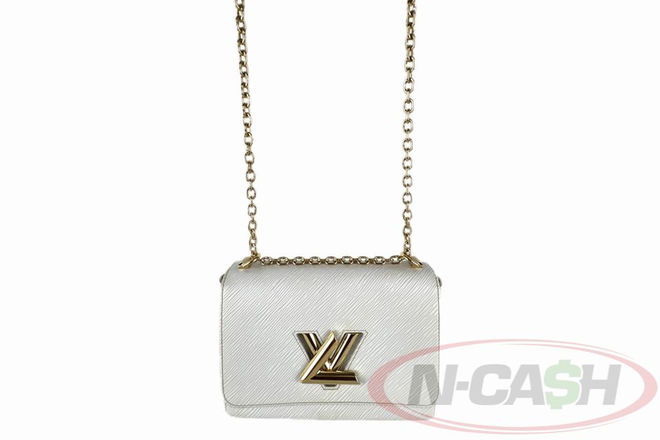 Louis Vuitton Twist MM (Category: Luxury Bags & Wallets) located in Makati City. Submitted by luxury_by_ncash_2 (Listing ID 1425857920, Image 3). Description: N-Cash Pawnshop "Instant Cash for Bags, Watches, Cars, and Electronics" https://www.ncash-pawnshop-philippines.com/ Louis Vuitton Twist MM PRE-OWNED Brand: LOUIS VUITTON Material: Silver Epi Leather Flap Top with LV Twist Lock Closure 2 Internal Patch Pockets Chain Strap with Leather Should
