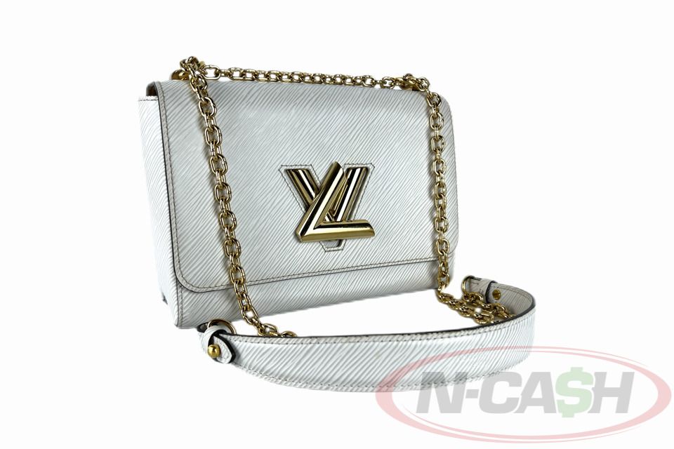 Louis Vuitton Twist MM (Category: Luxury Bags & Wallets) located in Makati City. Submitted by luxury_by_ncash_2 (Listing ID 1425857920, Image 1). Description: N-Cash Pawnshop "Instant Cash for Bags, Watches, Cars, and Electronics" https://www.ncash-pawnshop-philippines.com/ Louis Vuitton Twist MM PRE-OWNED Brand: LOUIS VUITTON Material: Silver Epi Leather Flap Top with LV Twist Lock Closure 2 Internal Patch Pockets Chain Strap with Leather Should