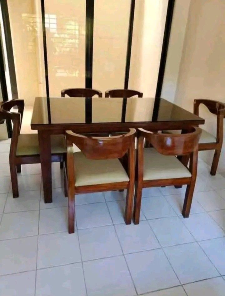 MAHOGANY ELEGANT DINING SET (Category: Tables & Sets) located in Mabalacat. Submitted by joemamangun01 (Listing ID 1425921401, Image 2). Description: High-quality Dining table set at an affordable price👌 Materials used: 📌Gemelina & mahogany wood 📌Uratex foam 📌German leather & fabric 📌Duco paint finished MADE TO ORDER⚒️ NO DP NEEDED✅ FREE TOP GLASS😍 COD & FREE DELIVERY 4 seater (3ft by 4ft) 6 seater (3ft by 5ft) 8 seater (3ft by 6ft) 10 seat
