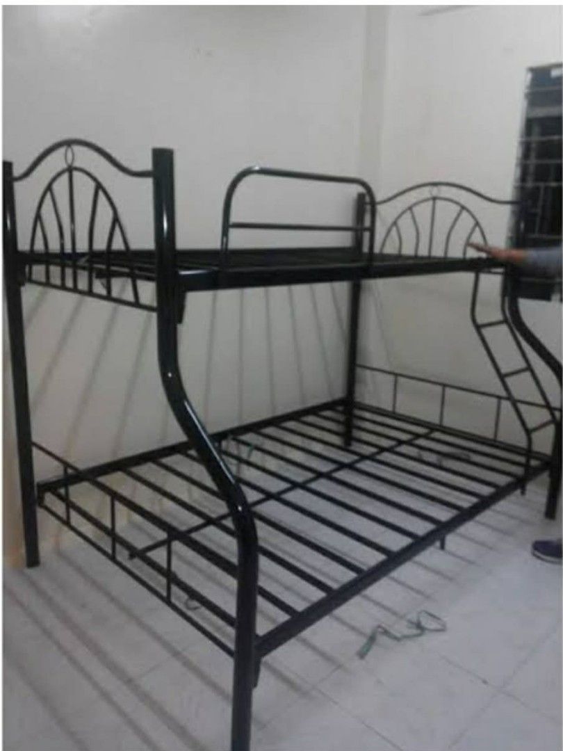 Metal Bunk Bed with Pullout 09676300168 (Category: Bed Frames & Mattresses) located in Manila. Submitted by dyan1111 (Listing ID 1425879971, Image 2). Description: Durable metal bunk bed with a pullout bed. Features a ladder for easy access to the top bunk. Includes mattresses. Available in black. The pullout bed size is 36x48x75 or 36x54x75. Perfect for maximizing space in a bedroom. Great for kids or guests..