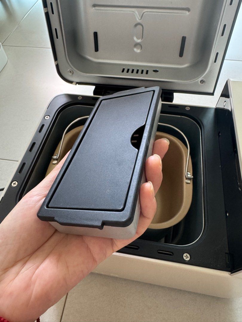 Multifunctional Bread Maker (Category: Breadmakers) located in Singapore. Submitted by soojiong (Listing ID 1425859915, Image 6). Description: -Only use a few times, like new -multifunctional -not only bread maker, you can also use it for mixing dough(noodles, dumplings, dessert, porridge, rice cake, ice cream) -can use for fermentation also, there is a fermentation mode. -China adapter needed. -Only deal at Soo Teck Lrt (1 stop away from Punggol