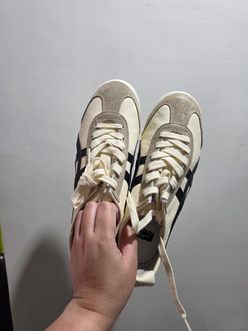 Onitsuka Tiger Mexico 66 Unisex (Category: Sneakers) located in Manila. Submitted by jinniecake (Listing ID 1425911279, Image 1). Description: Onitsuka Tiger Mexico 66 Ivory Black Size: US 7, Eur 8 (see pic) Bought from Japan last Feb 2025 With minimal marks on the suede area. See picture. Brand new RFS: Have other shoes na mas pinipick ko for daily use..