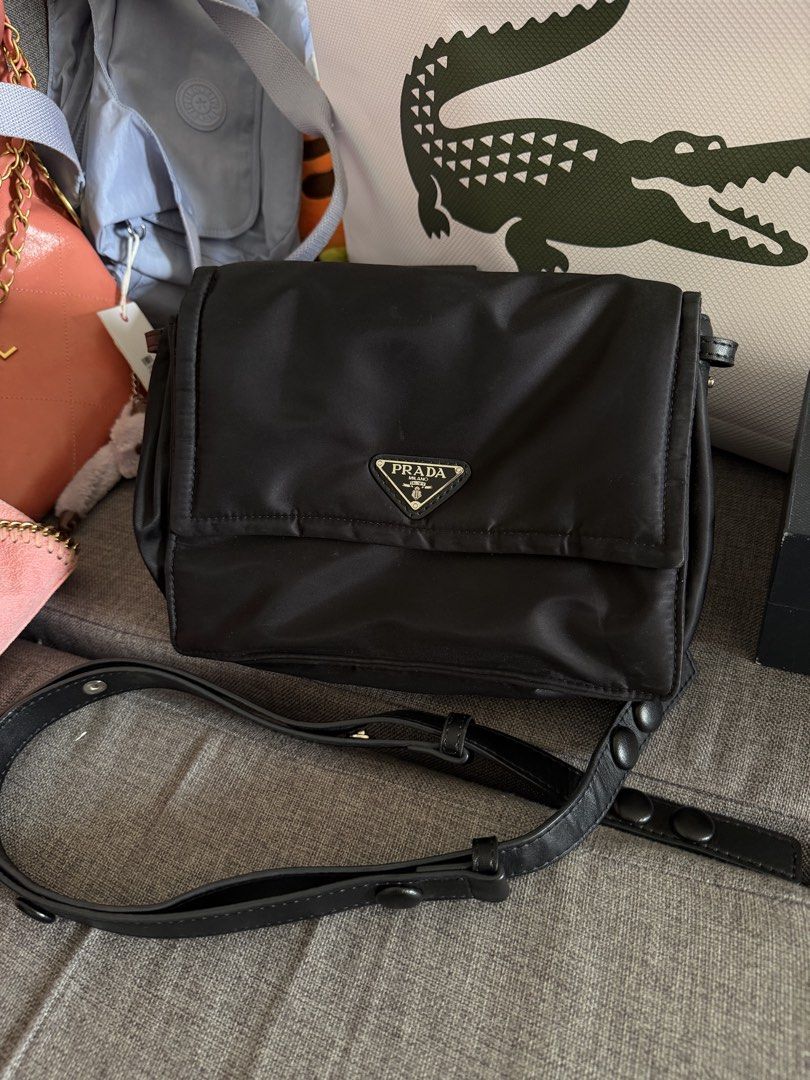 Prada Black Nylon Crossbody Bag (Category: Luxury Bags & Wallets) located in Quezon City. Submitted by egptasiaco (Listing ID 1425848849, Image 2). Description: Prada nylon bought from japan With 8 compartments.