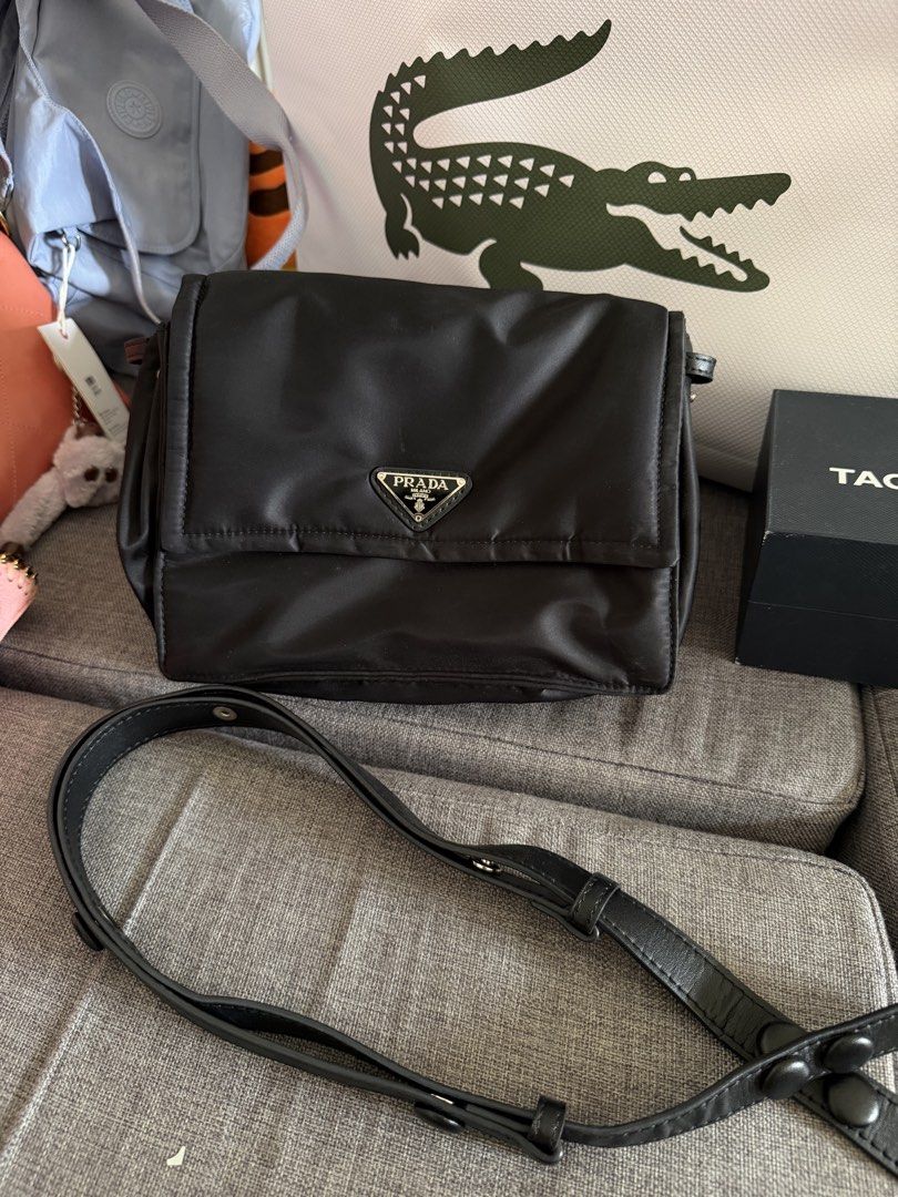 Prada Black Nylon Crossbody Bag (Category: Luxury Bags & Wallets) located in Quezon City. Submitted by egptasiaco (Listing ID 1425848849, Image 1). Description: Prada nylon bought from japan With 8 compartments.