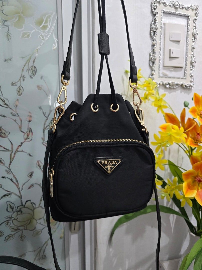 Prada duet bucket bag (Category: Luxury Bags & Wallets) located in Valenzuela. Submitted by cheas077 (Listing ID 1425991644, Image 1). Description: prada duet bucket bag nylon material no issue .