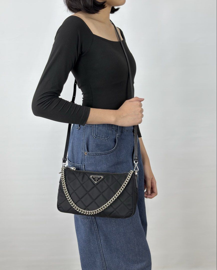 Prada Tessuto Impuntu Quilted Nylon (Category: Luxury Bags & Wallets) located in Manila. Submitted by luxuryprelovedbagsby_by_agnes (Listing ID 1425968771, Image 2). Description: Excellent Condition RFID Version Perfect size / Simple Goes with everything Dimensions: W 23cm x H 13cm x D 7 cm.