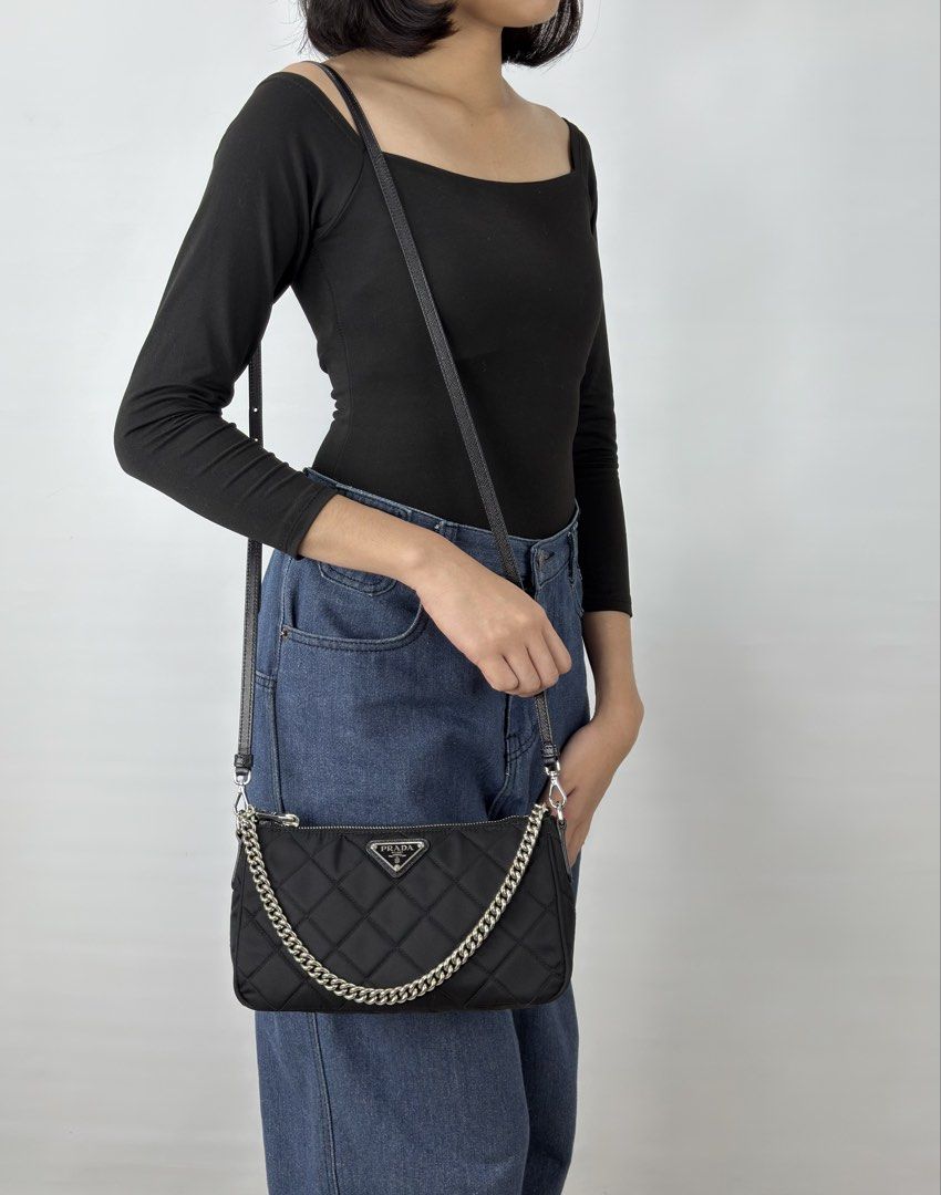 Prada Tessuto Impuntu Quilted Nylon (Category: Luxury Bags & Wallets) located in Manila. Submitted by luxuryprelovedbagsby_by_agnes (Listing ID 1425968771, Image 3). Description: Excellent Condition RFID Version Perfect size / Simple Goes with everything Dimensions: W 23cm x H 13cm x D 7 cm.