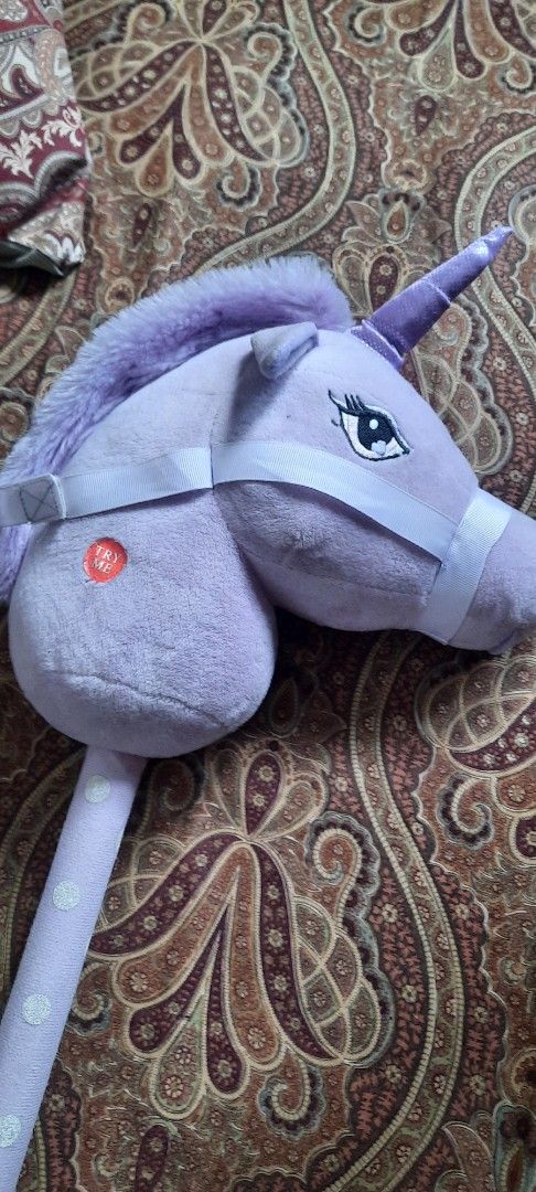 Purple Unicorn Stick Horse (Category: Plushies & Soft Toys) located in Makati City. Submitted by jackstereo777 (Listing ID 1425852963, Image 2). Description: Horsey Pogo Plushie: approx 2.5 ft, for motor skills development and fun playtime. As is. Shipping c/o buyer. .