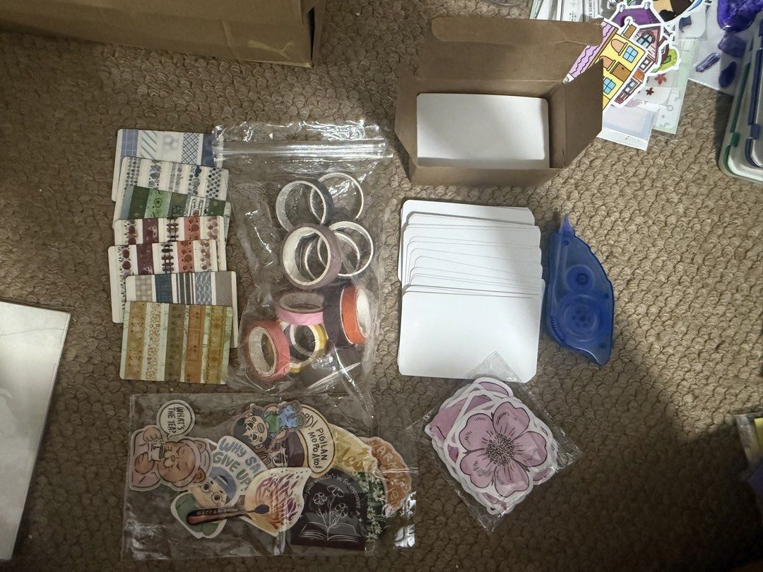 Random Journal/Scrapbooking Materials Bundle (Category: Craft Supplies & Tools) located in Mandaluyong City. Submitted by pyba_ (Listing ID 1425966179, Image 3). Description: Includes a mix of: • sticker sheets • die-cut stickers • washi tapes • memo papers • journaling cards • decorative papers • stamps & ink pads • pens / markers Some items are unused, some were lightly used (mostly just opened but not really used for journaling). **RFS:** Movi