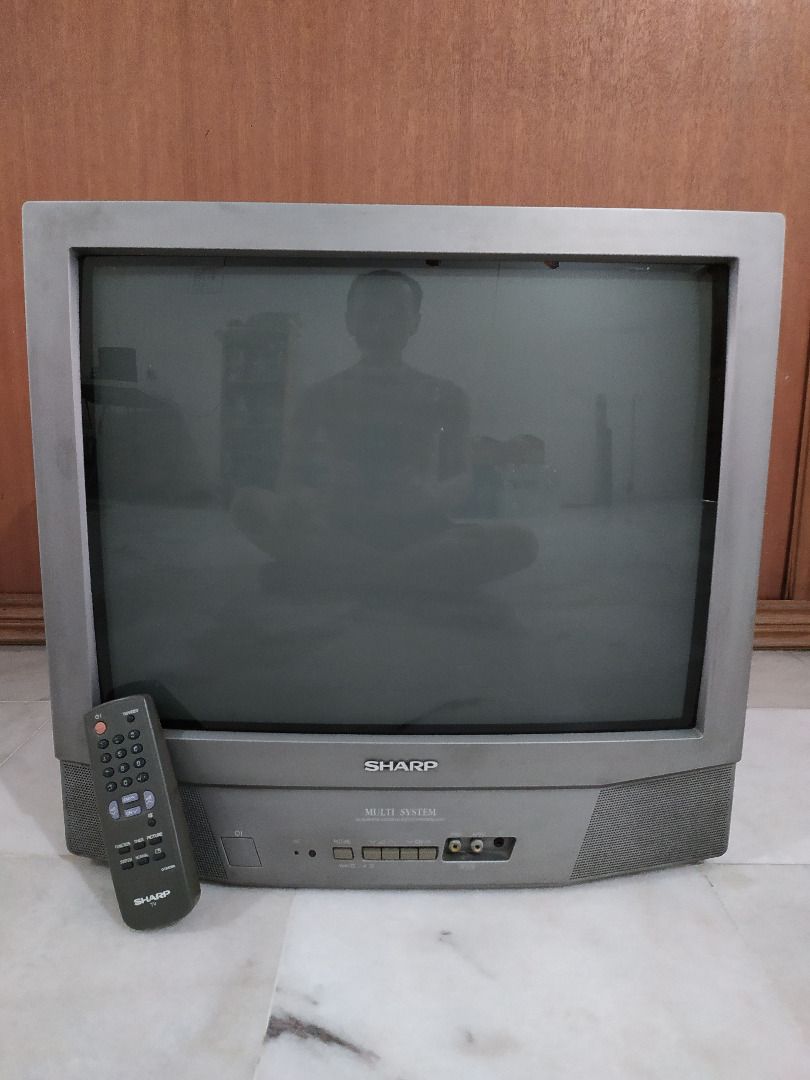 Sharp Solid State TV 21" w/ Remote (Category: TV) located in Puchong. Submitted by optimusone (Listing ID 1425891349, Image 1). Description: Brand: Sharp. Model: 21A1-A Original vintage with serial number Solid State Colour Television 21-inch Remote control No scratch/burn pixel on CRT screen No Google/Android OS ads Fault: Press "On" few times to start Most likely Power Supply capacitor dry out Condition: Used and Defective Market value RM150 se