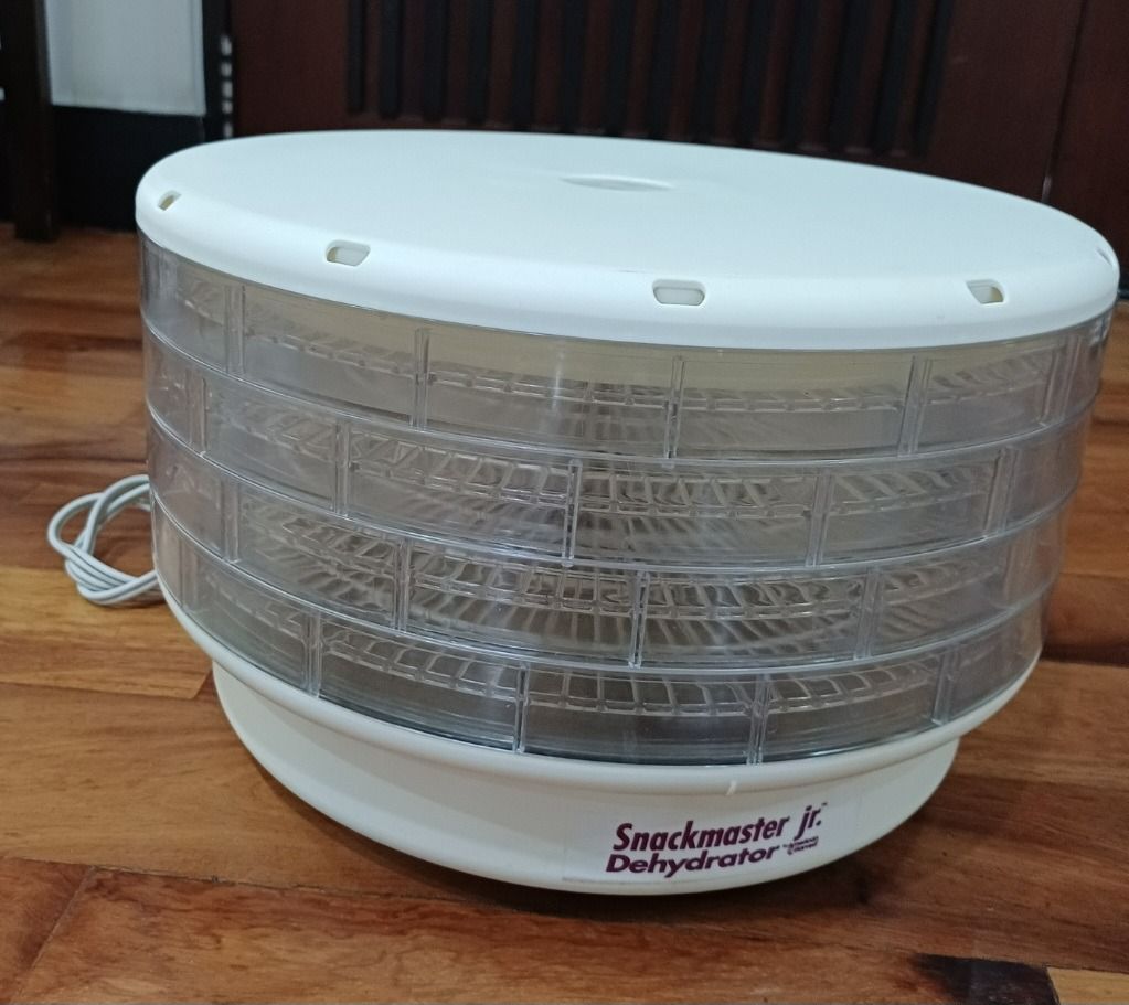 Snackmaster Jr. Dehydrator (110V) (Category: Other Kitchenware & Tableware) located in Quezon City. Submitted by CraftsItemsCleanUpSale (Listing ID 1425976592, Image 2). Description: [Decluttering Sale] Snackmaster Jr. Dehydrator Food Dehydrator Model FD-20 Volts 120, 60Hz Watts 300 (with original box) American Harvest S/N: 79DZG105909 *Please read: Items Clean Up Sale Please chat with me for any questions or for more photos. Items are sold as is
