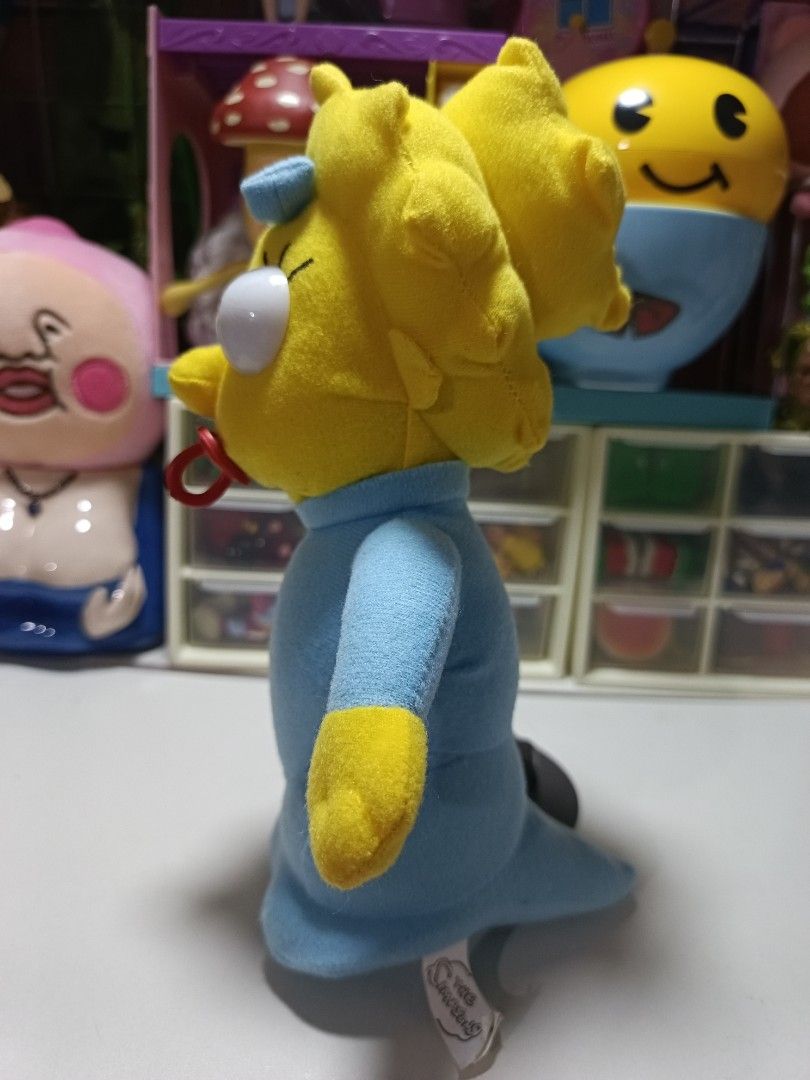 The Simpsons Maggie Simpson Plush Toy (Category: Plushies & Soft Toys) located in Paranaque City. Submitted by niropa (Listing ID 1425830530, Image 2). Description: Flaw: eyes have fine cracks (pls check the picture) .