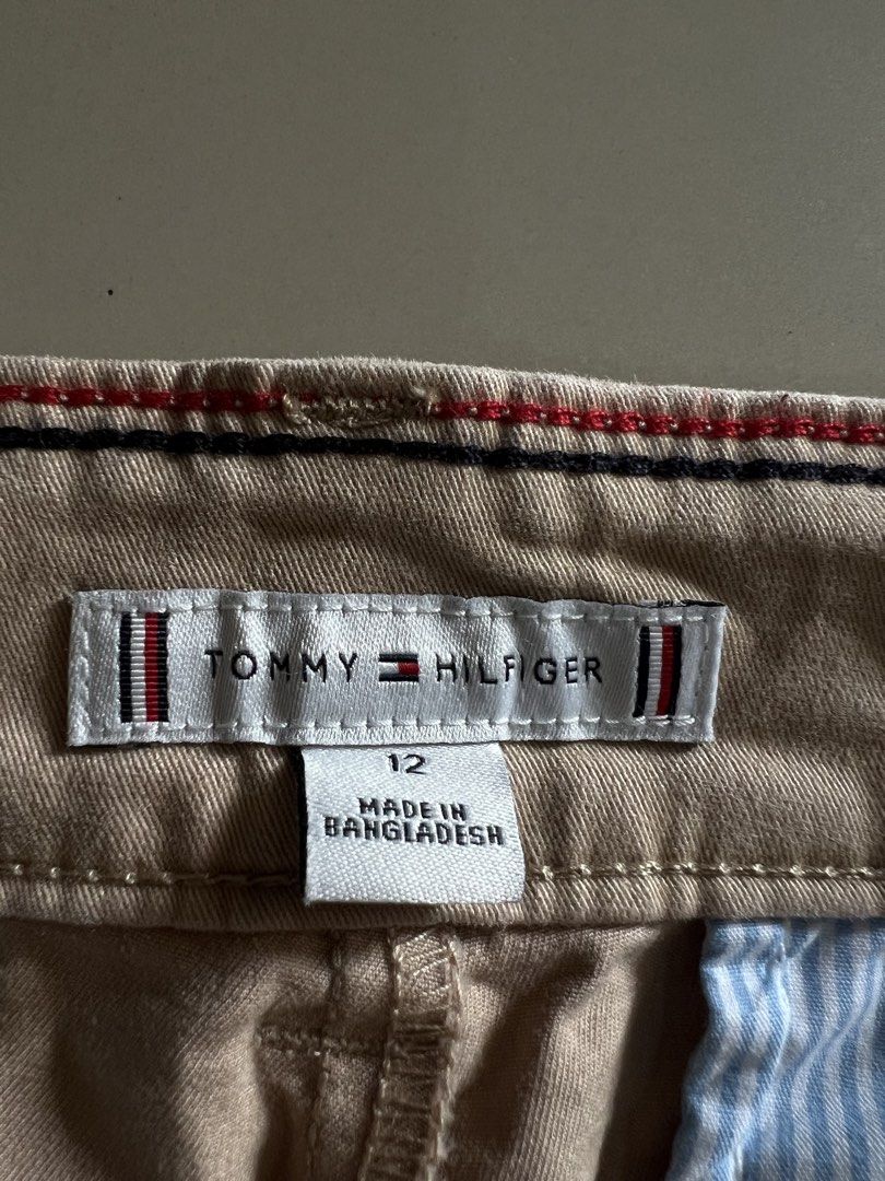 Tommy Hilfiger Chino Trousers (Category: Other Bottoms) located in Malay. Submitted by spacetrips (Listing ID 1425900615, Image 3). Description: Price: ₱500 (Last price) Shipping: ₱60 Details: • Brand: Tommy Hilfiger • Size: 14 (XL equivalent) • Color: Classic Black • Fabric: High-quality cotton blend with stretch. • Features: Classic straight-leg fit, signature Tommy Hilfiger branding on the inner waistband, functional pockets, and belt loops. •