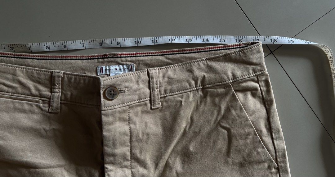 Tommy Hilfiger Chino Trousers (Category: Other Bottoms) located in Malay. Submitted by spacetrips (Listing ID 1425900615, Image 2). Description: Price: ₱500 (Last price) Shipping: ₱60 Details: • Brand: Tommy Hilfiger • Size: 14 (XL equivalent) • Color: Classic Black • Fabric: High-quality cotton blend with stretch. • Features: Classic straight-leg fit, signature Tommy Hilfiger branding on the inner waistband, functional pockets, and belt loops. •