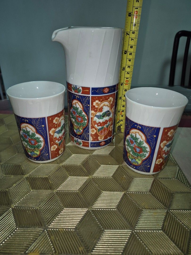 Vintage Porcelain Tea Set with Floral Design
