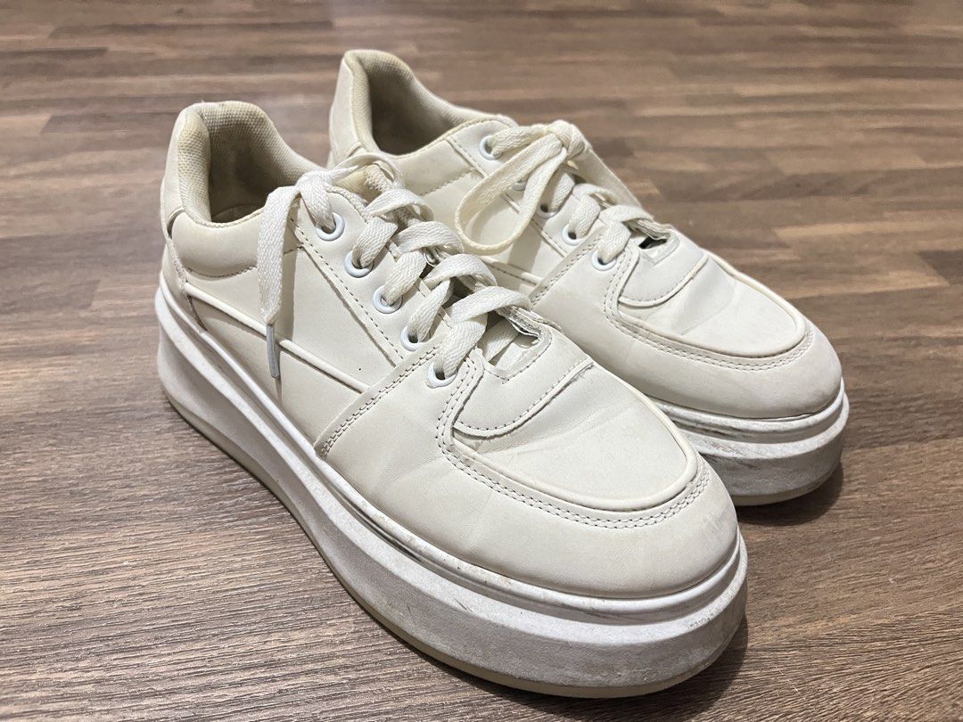 White Platform Korean Sneakers - White/Cream (Category: Sneakers) located in Rizal. Submitted by chezcaaphrodite (Listing ID 1425933394, Image 3). Description: White/Cream platform rubber shoes Size: 39 - medyo madumi need labhan kasi matagal nastock, di na nagagamit.