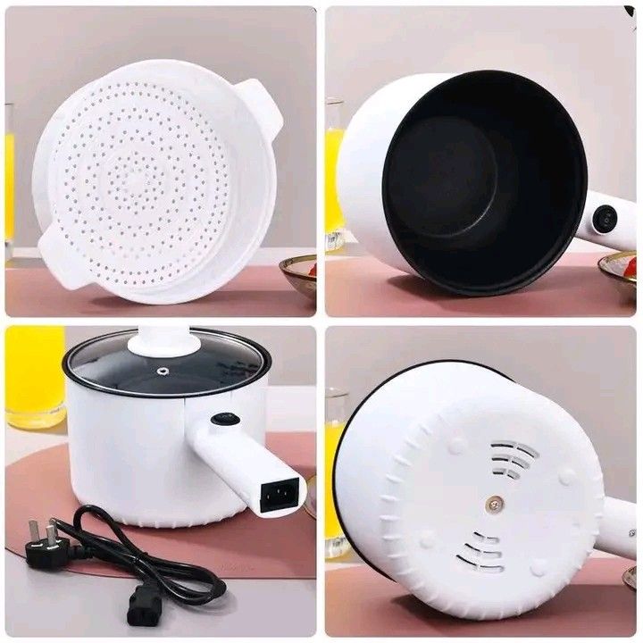 1.5L Multifunction Electric Cooker with Steamer (Category: Cookers) located in Manila. Submitted by legitseller_angel06 (Listing ID 1426034355, Image 3). Description: 1.5L electric cooker is perfect for steaming and cooking. It features a non-stick inner pot and a steamer basket. It has dual power settings and a glass lid. The cooker is white with a black interior. It's ideal for small meals and easy to clean..
