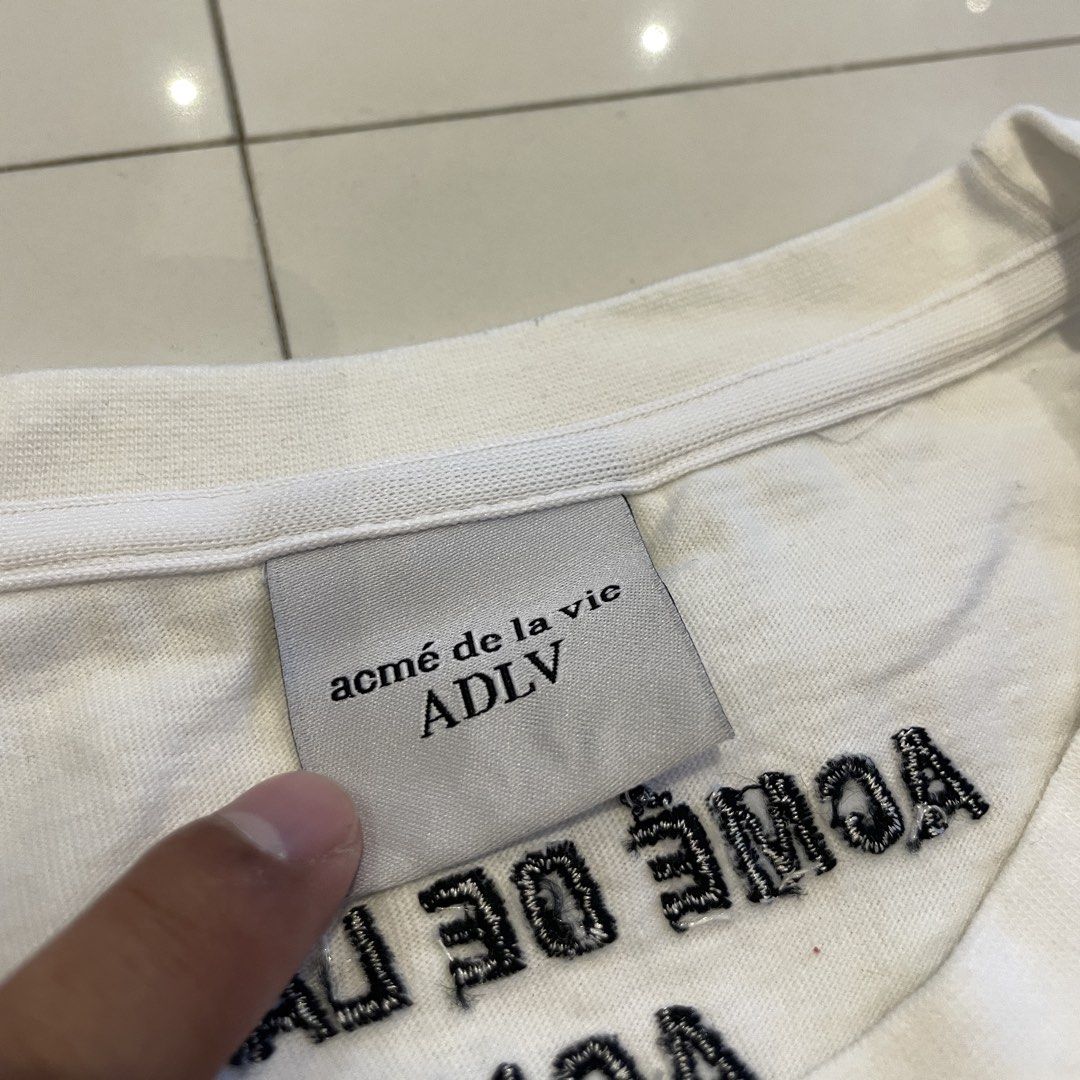 ACME DE LA VIE Tshirt (ADLV) (Category: Tshirts & Polo Shirts ) located in Binan City. Submitted by vintagedrops (Listing ID 1426025663, Image 3). Description: 26x24 dimensions Excellent condition Authentic Med to large sizing 9.5 color rate 880 plus sf only .