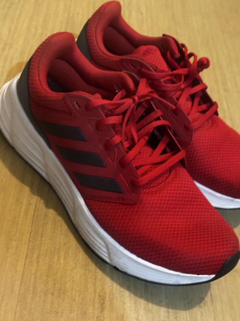 Adidas Galaxy 5 Red Running Shoes (Category: Sneakers) located in Manila. Submitted by fckingyoungg (Listing ID 1426135250, Image 2). Description: Used once. Bought abroad. RFS: Wrong size. Orig price: 3,500 PHP .