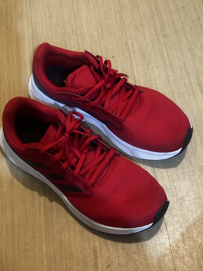 Adidas Galaxy 5 Red Running Shoes (Category: Sneakers) located in Manila. Submitted by fckingyoungg (Listing ID 1426135250, Image 1). Description: Used once. Bought abroad. RFS: Wrong size. Orig price: 3,500 PHP .